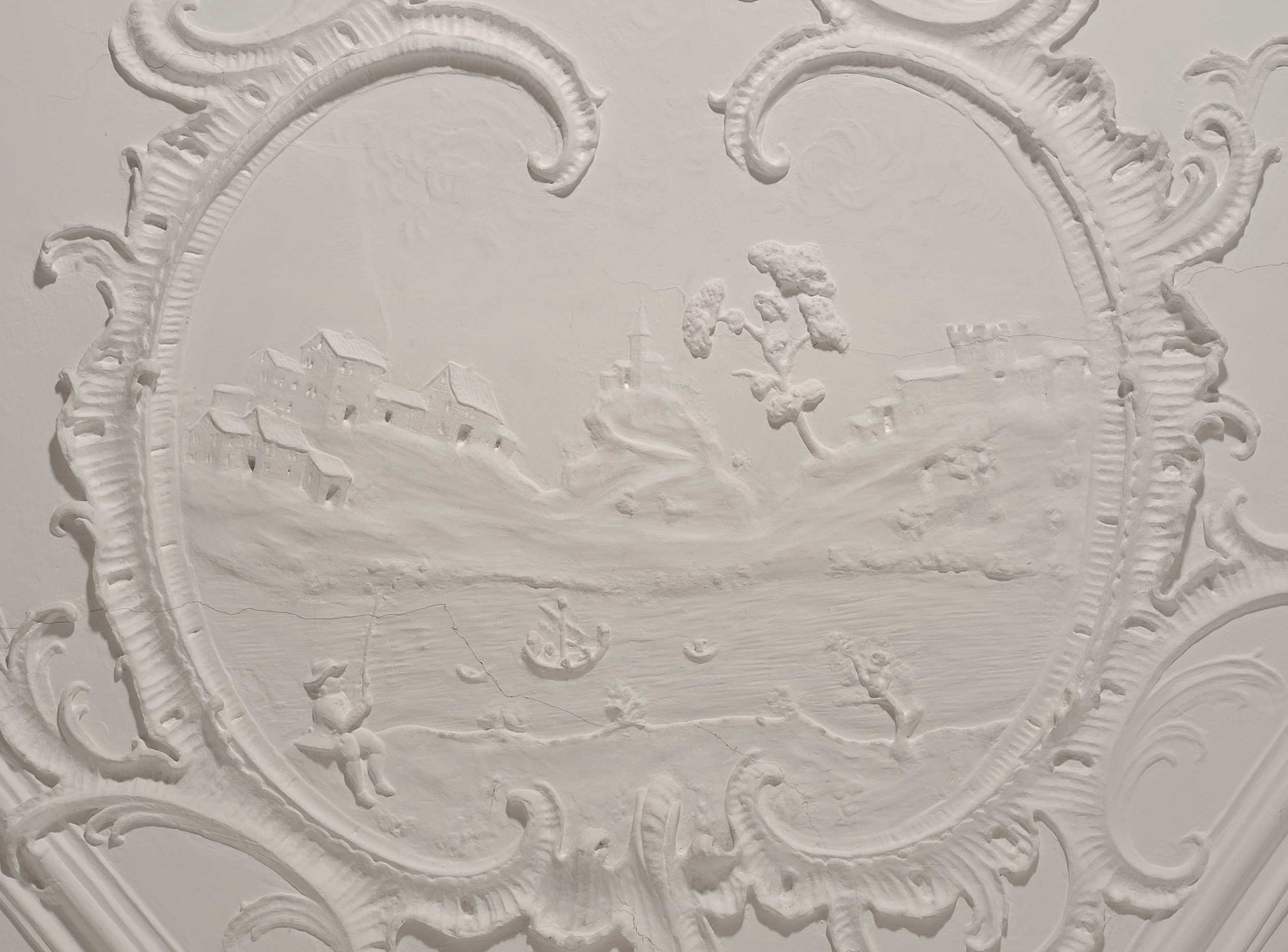 Detail einer Stuckkartusche im ehemaligen Gasthaus zum Goldenen Adler.